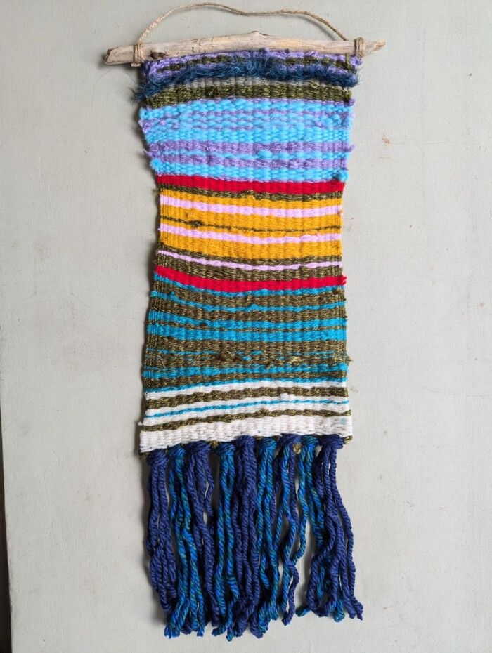 Small woven wall-hanging